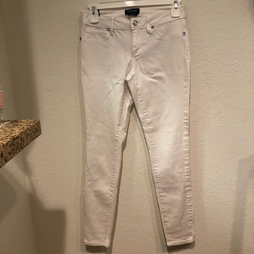 White Bebe Skinny Jeans with Bebe Print